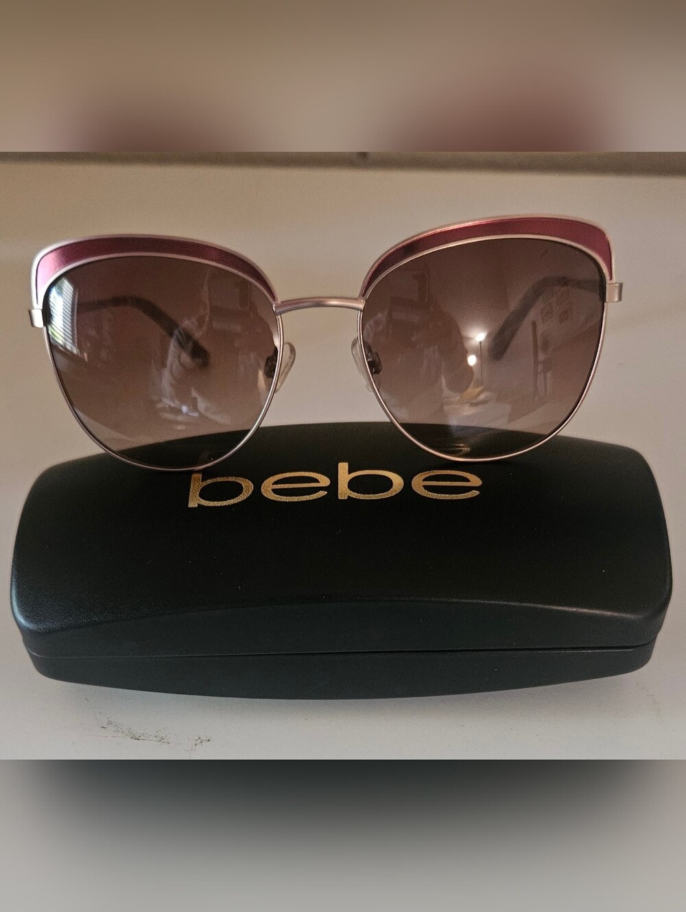 BEBE Rosegold Tone Sunglasses w/colored brow Detail